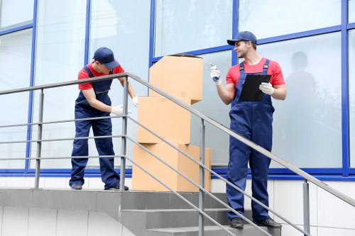 Professional moving team reviewing service details