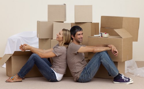 Loading furniture and boxes into a van for a Stockwell relocation