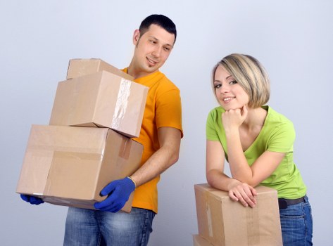 Removal vehicle and moving boxes prepared for transport