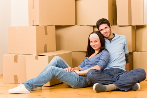 Loading furniture into a moving truck on a Stockwell street