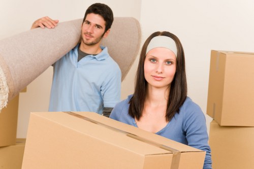 Experienced movers handling access challenges in a Stockwell flat