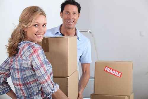 Packed boxes and protective wrapping prepared for a Stockwell apartment move