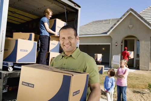 Stockwell moving service handling boxes and furniture
